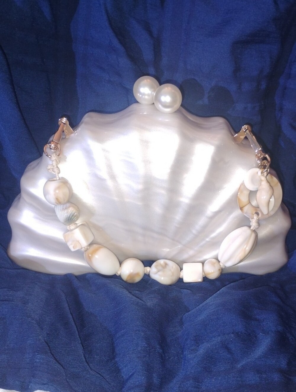 Pearl-Embellished Shell-Shaped Clutch in Ivory